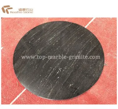 Piani tavolo in granito nero di forma rotonda Angtha